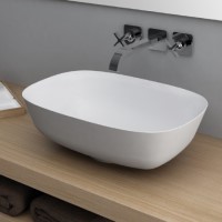 A clean and simple rectangular vessel sink with gently rounded corners