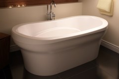 Freestanding Oval Bath, Curving Skirt, Center Side Drain, Raised Backrests