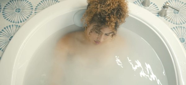 Girl Soaking in a Tub