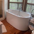 Oval Freestanding Tub with Flat Rim, Slotted Overflow, Armrests