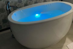 Small Oval Freestanding Tub, Wide Rim, Curving Sides